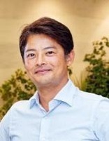 小谷勲氏（写真）